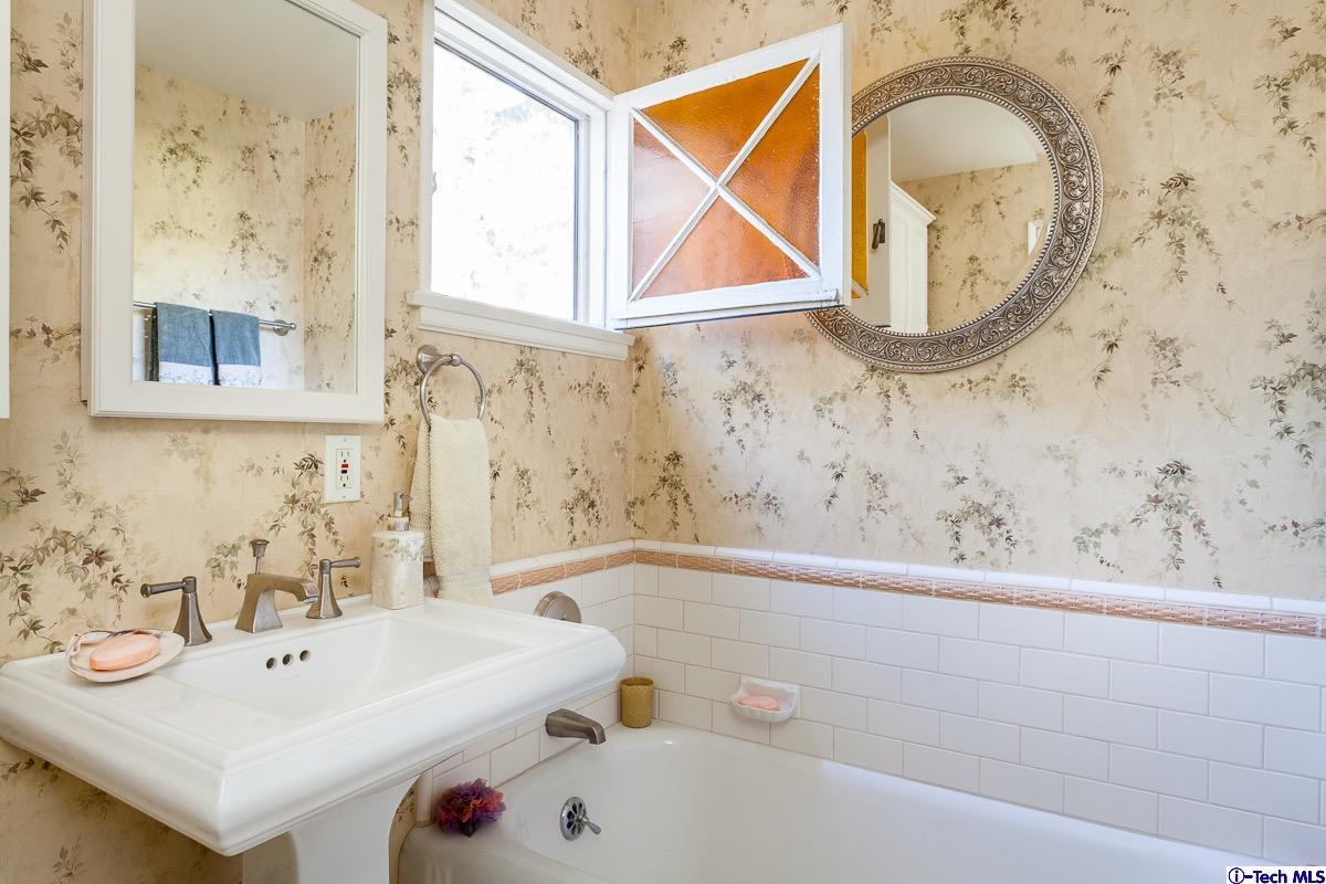44 San Miguel Road Pasadena, CA 91105 - Photo 17 of 18 a bathroom with a sink and a bathtub