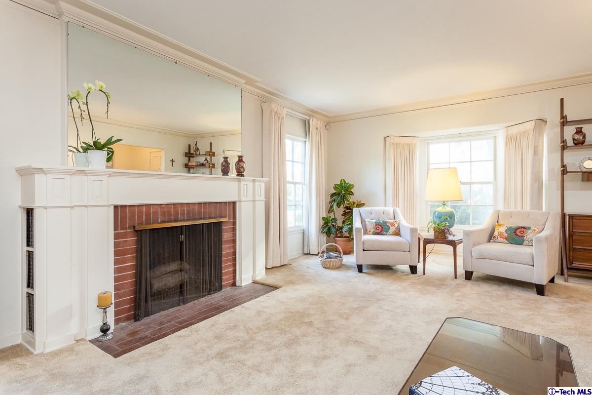 44 San Miguel Road Pasadena, CA 91105 - Photo 5 of 18 a living room with furniture and a fireplace