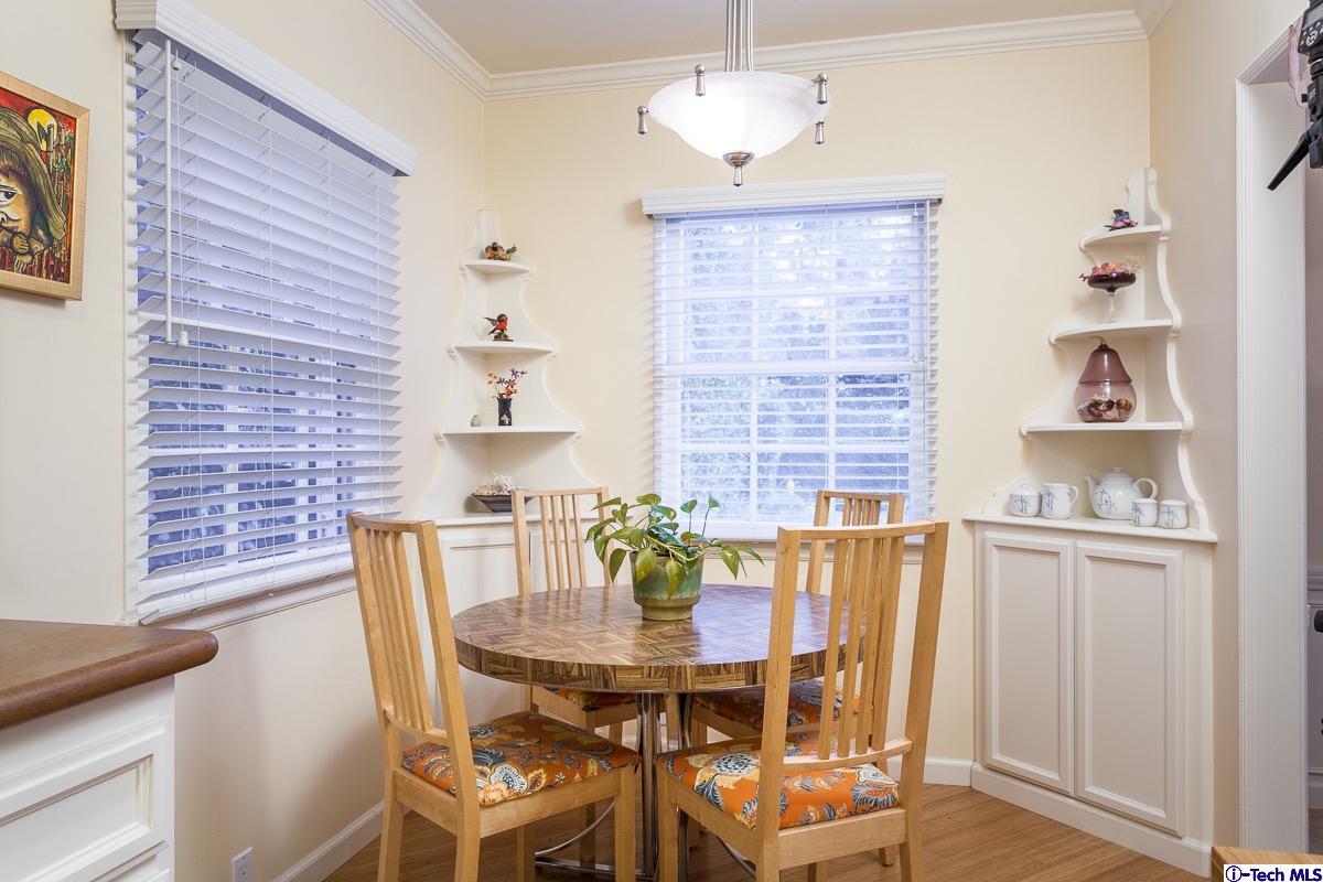 44 San Miguel Road Pasadena, CA 91105 - Photo 10 of 18 a view of a dining room with furniture and chandelier