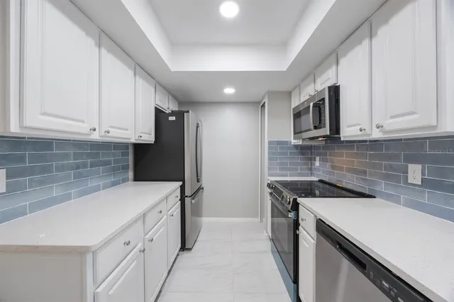 a view of a hallway with a large window