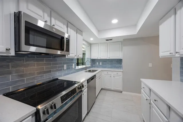 a view of a big room with a large window