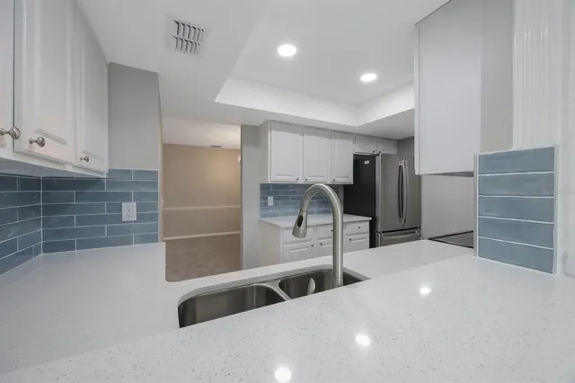 a view of an empty room with a large window