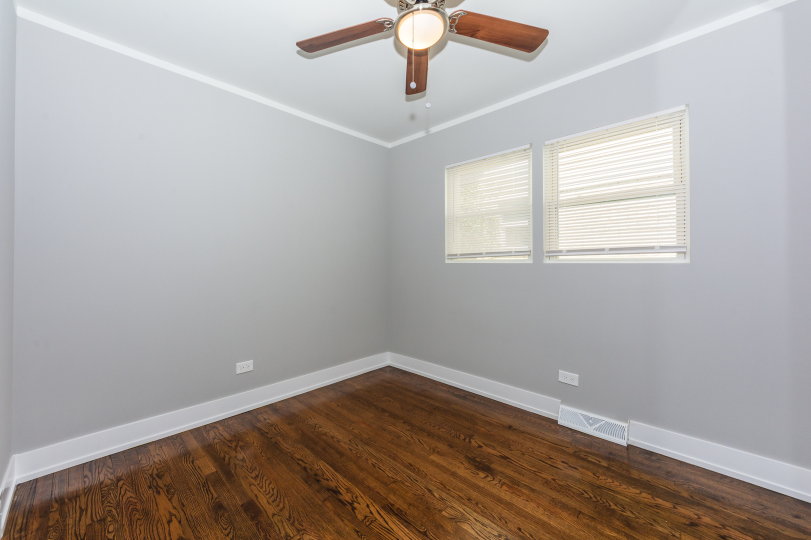2840 140th Street Blue Island, IL 60406 - Photo 11 of 16 wooden floor in an empty room with a window