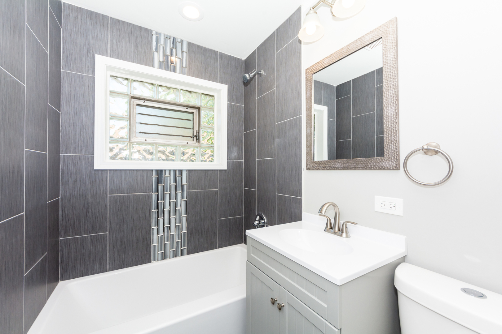 2840 140th Street Blue Island, IL 60406 - Photo 12 of 16 a bathroom with a sink toilet and shower