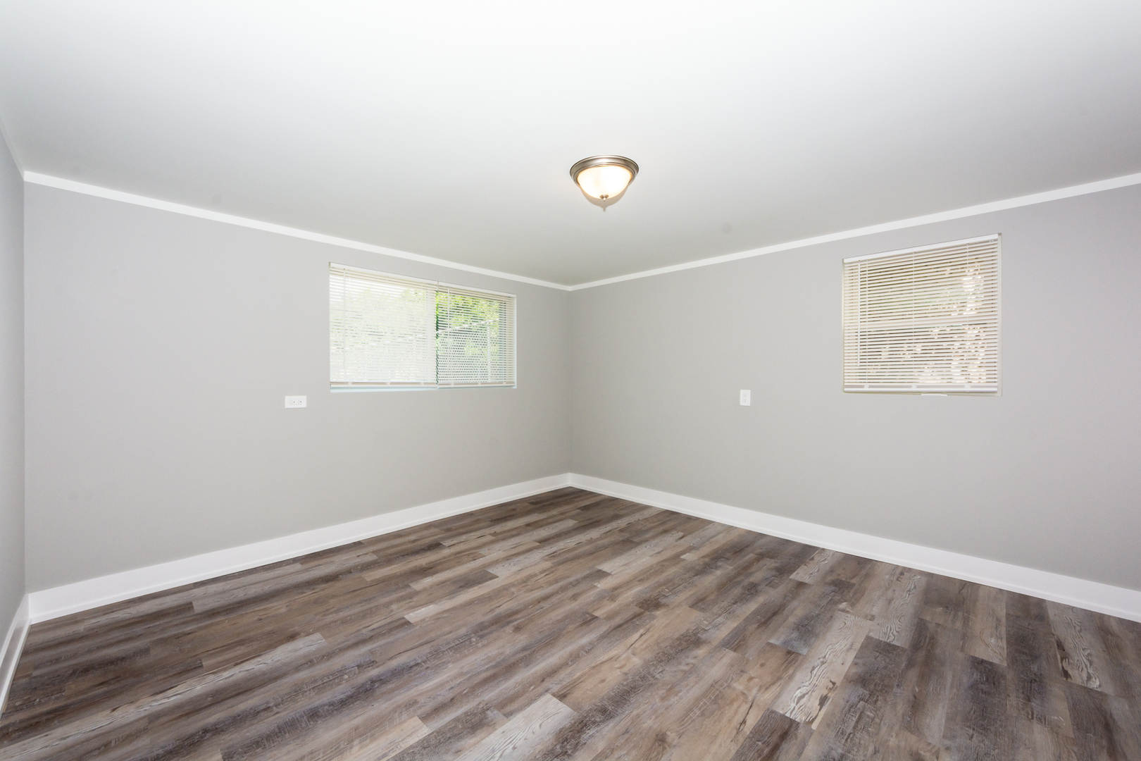 2840 140th Street Blue Island, IL 60406 - Photo 13 of 16 an empty room with wooden floor and windows