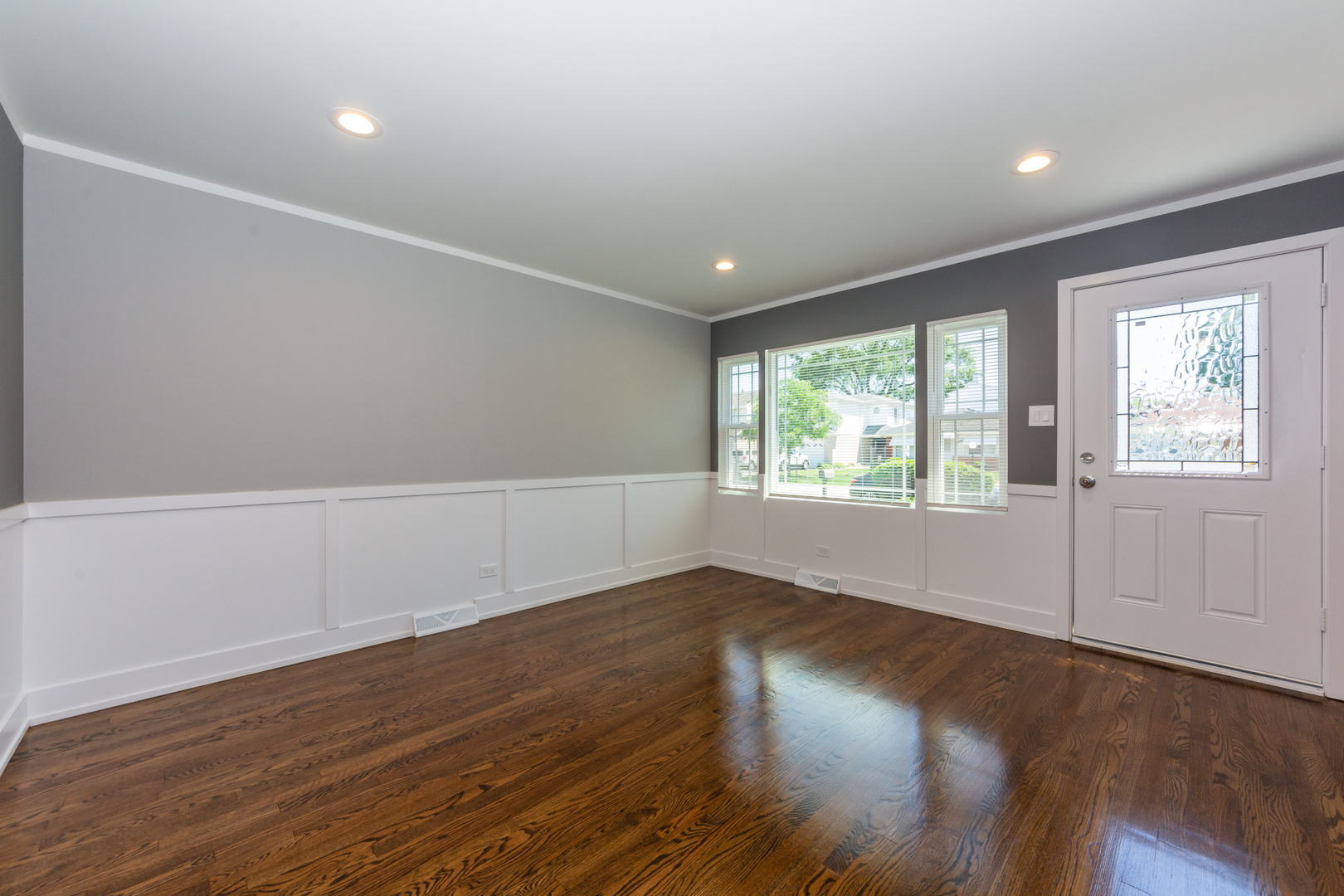 2840 140th Street Blue Island, IL 60406 - Photo 5 of 16 a view of an empty room with wooden floor and a window