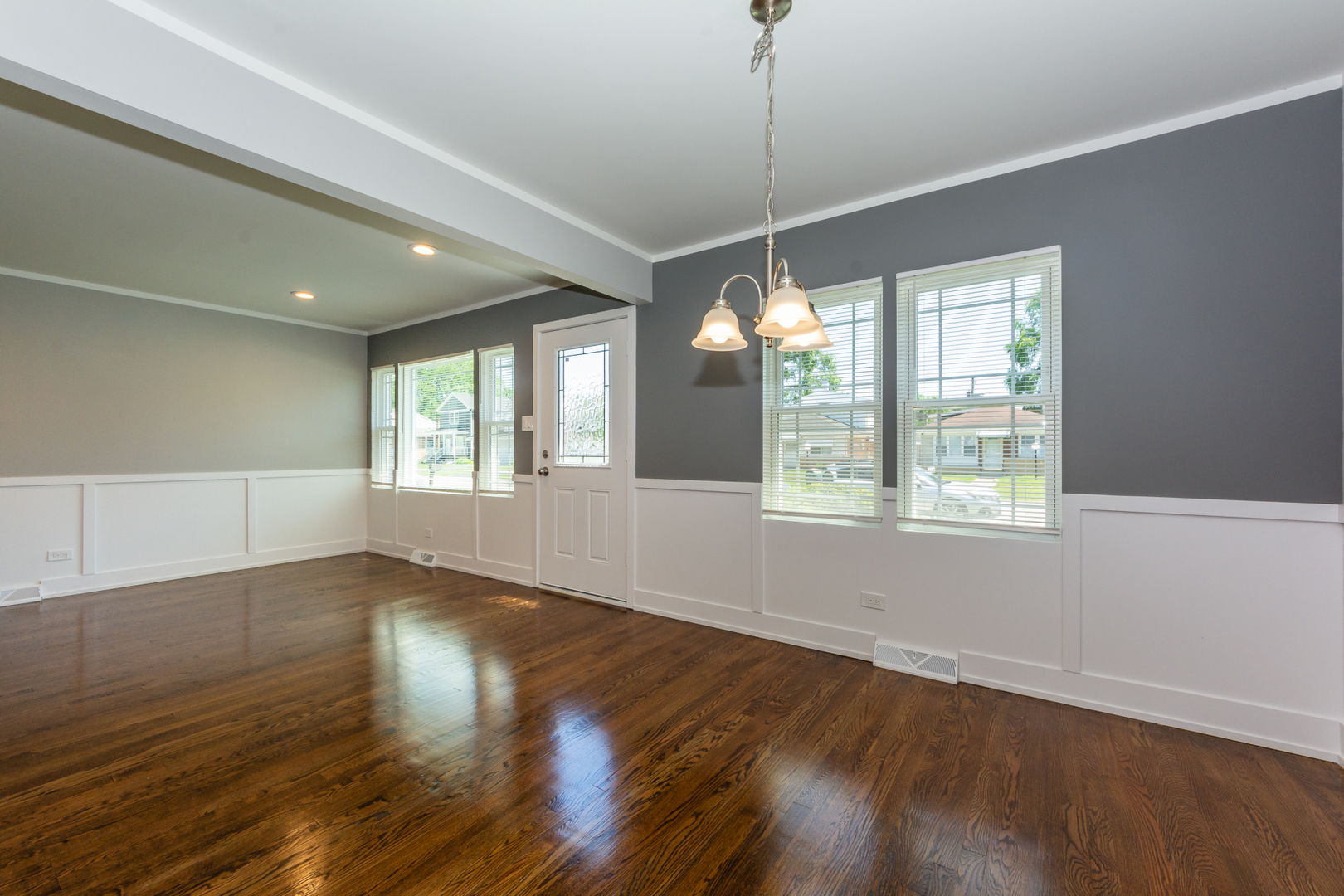 2840 140th Street Blue Island, IL 60406 - Photo 10 of 16 a view of an empty room with wooden floor and a window