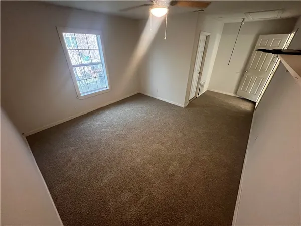 a kitchen with stainless steel appliances a sink and cabinets