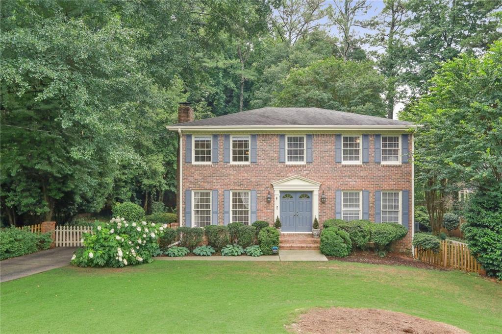 Grand 4 bedroom, 2.5 bath mid-century executive home in beloved Evansdale/Henderson/Lakeside school district!