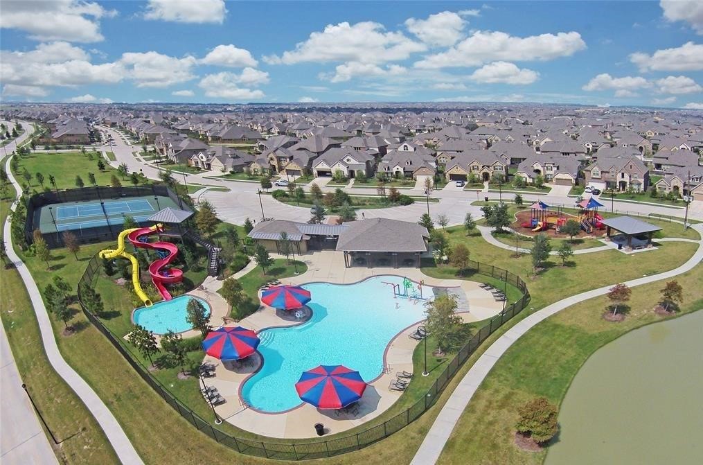 26422 Red Cliff Ridge Katy, TX 77494 - Photo 37 of 40 Another of the community pools you will have access to as a resident of Cinco Ranch. The kids will love the water park at this one!