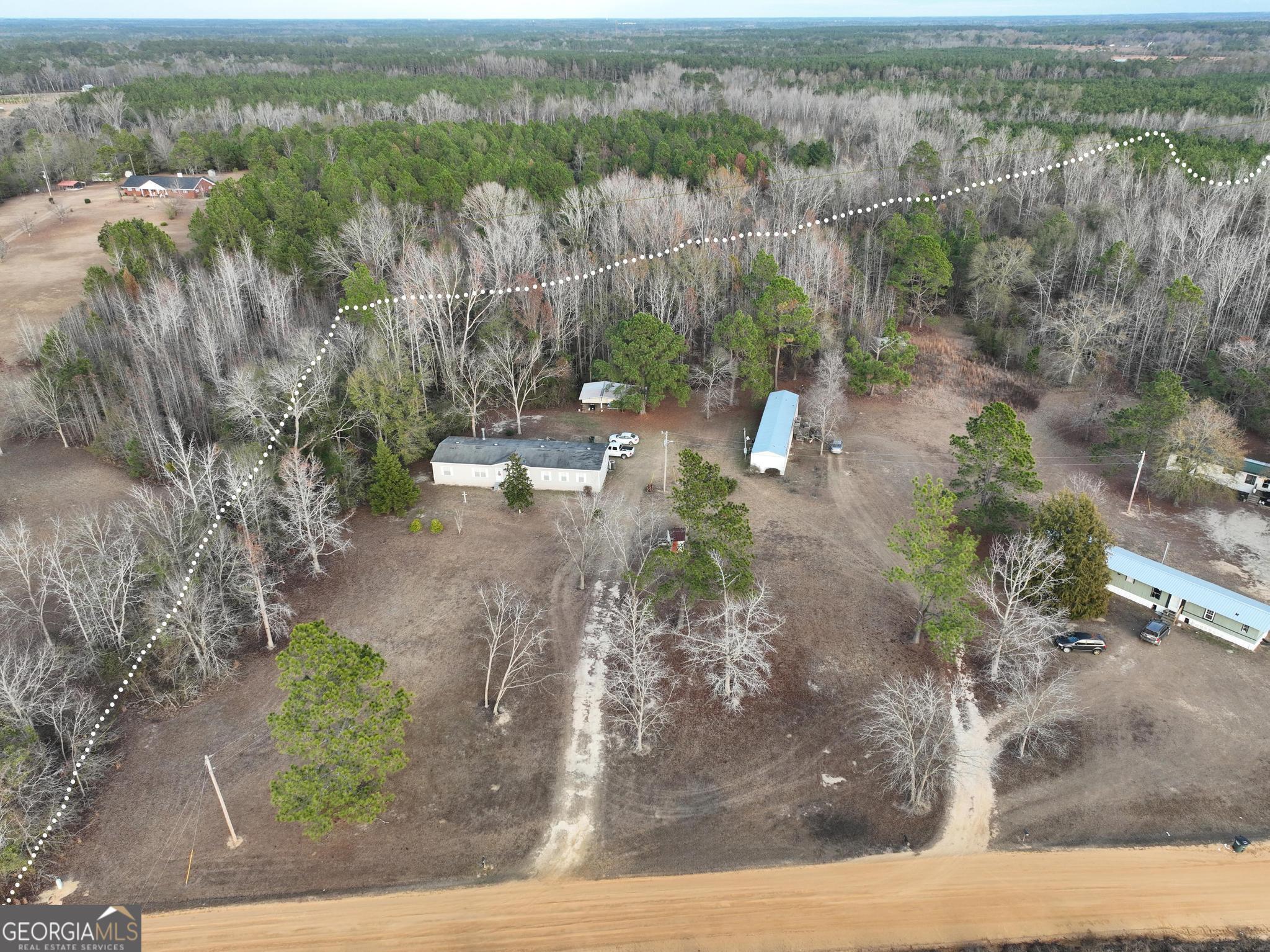 1500 Mallard Road Cobbtown, GA 30420 - Photo 14 of 20 a view of a yard with large trees