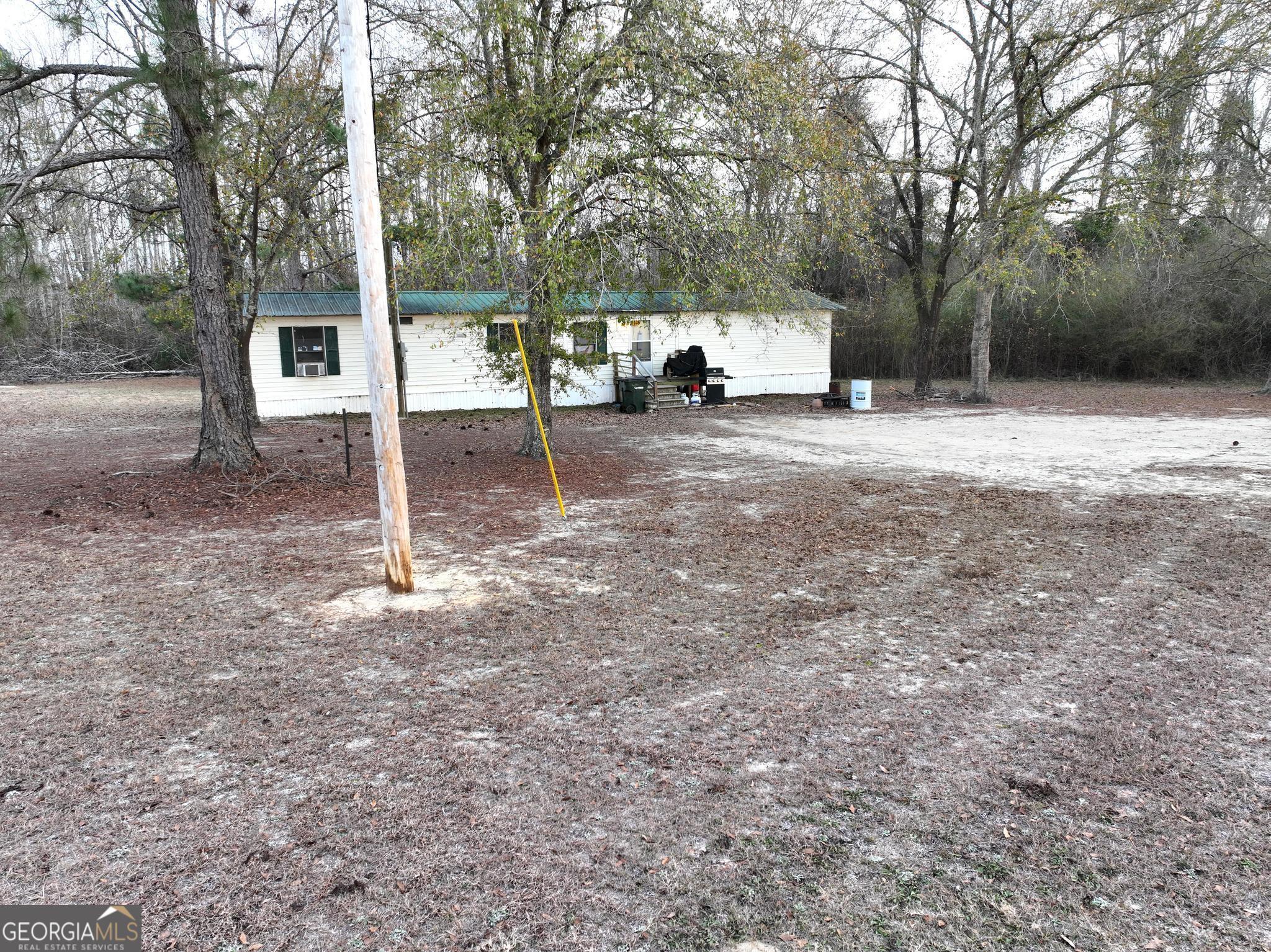 1500 Mallard Road Cobbtown, GA 30420 - Photo 19 of 20 a view of a outdoor space with a house