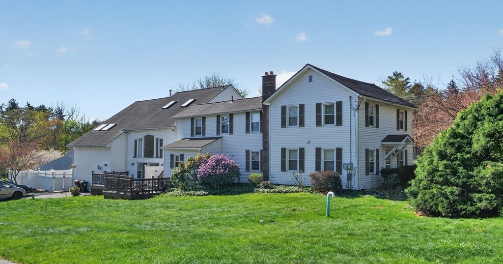 67 Amherst Road, Unit 67 South Hadley, MA 01075 - Photo 1 of 27 a front view of house with yard and green space