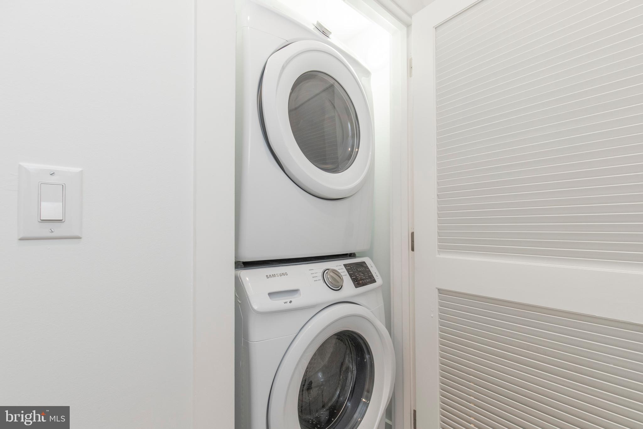 2412 Master Street, Unit A Philadelphia, PA 19121 - Photo 23 of 25 a utility room with dryer and washer