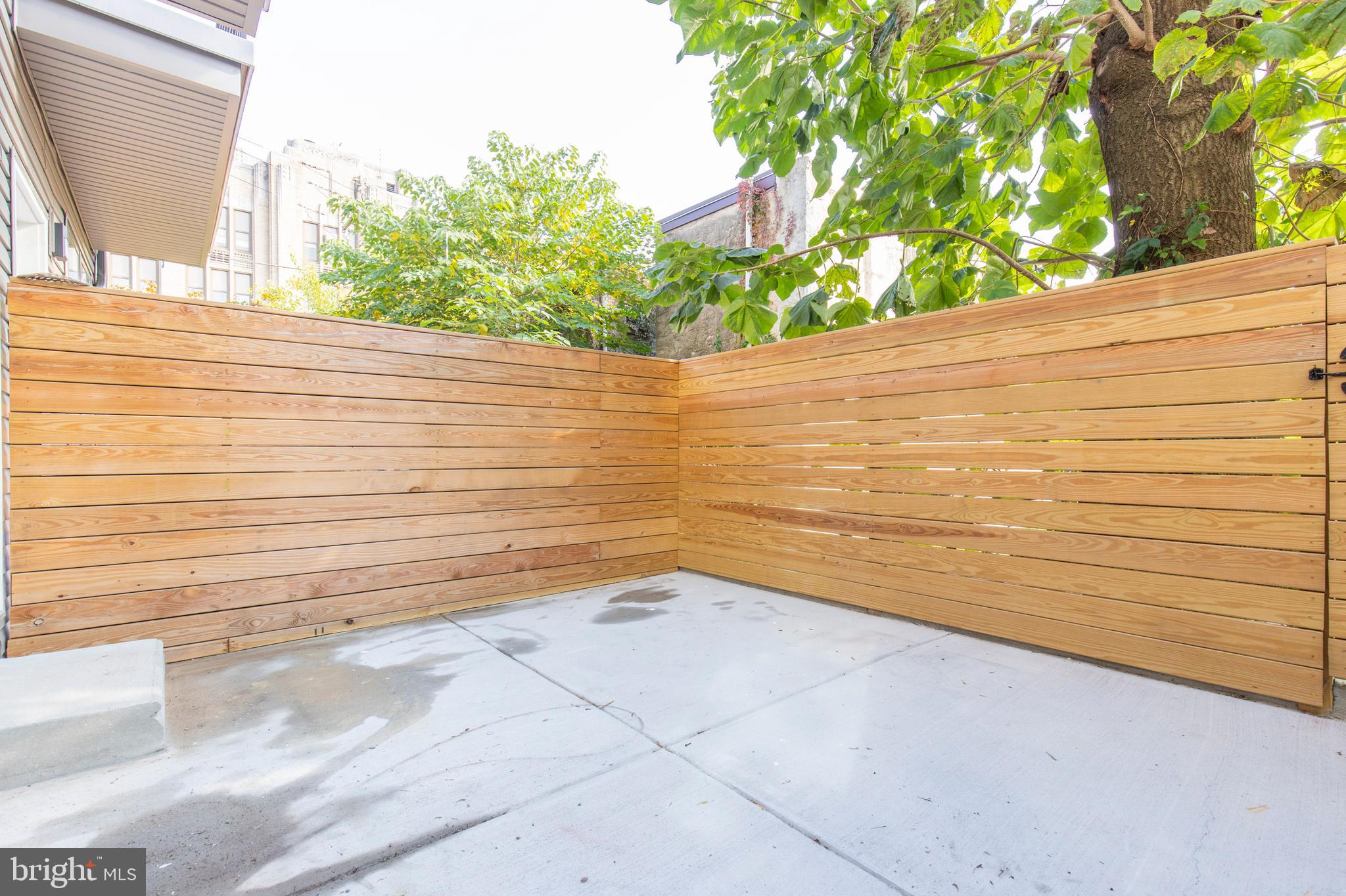 2412 Master Street, Unit A Philadelphia, PA 19121 - Photo 25 of 25 a view of a wooden floor and an outdoor space