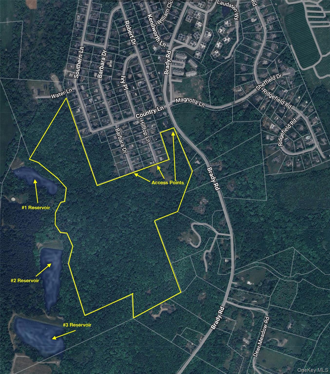 Brady Road Warwick, NY 10990 - Photo 4 of 13 a utility room with water heater and wooden cabinets