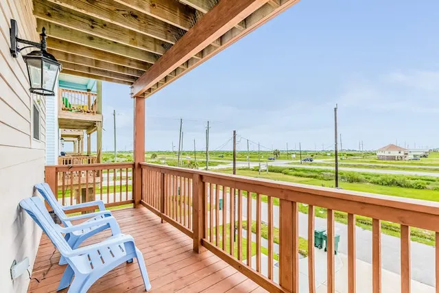 a view of balcony with furniture