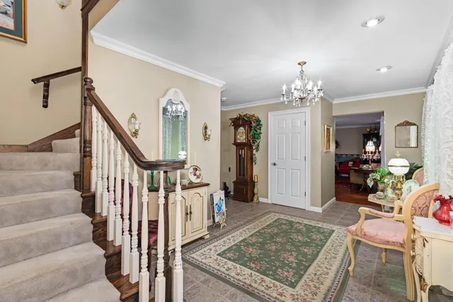 a view of a hallway view with staircase