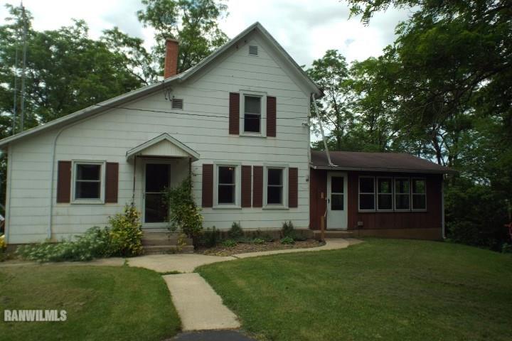3492 South Eby's Mill Road Elizabeth, IL 61028 - Photo 1 of 20 a view of house with yard and green space