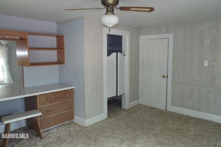 3492 South Eby's Mill Road Elizabeth, IL 61028 - Photo 13 of 20 a view of an empty room with a cabinet