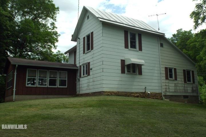 3492 South Eby's Mill Road Elizabeth, IL 61028 - Photo 16 of 20 a brick house with a yard