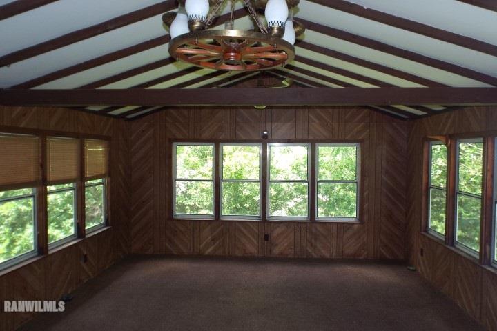 3492 South Eby's Mill Road Elizabeth, IL 61028 - Photo 5 of 20 a view of backyard with large windows