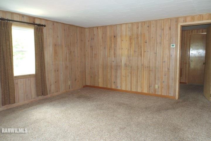 3492 South Eby's Mill Road Elizabeth, IL 61028 - Photo 7 of 20 a view of an empty room with a window