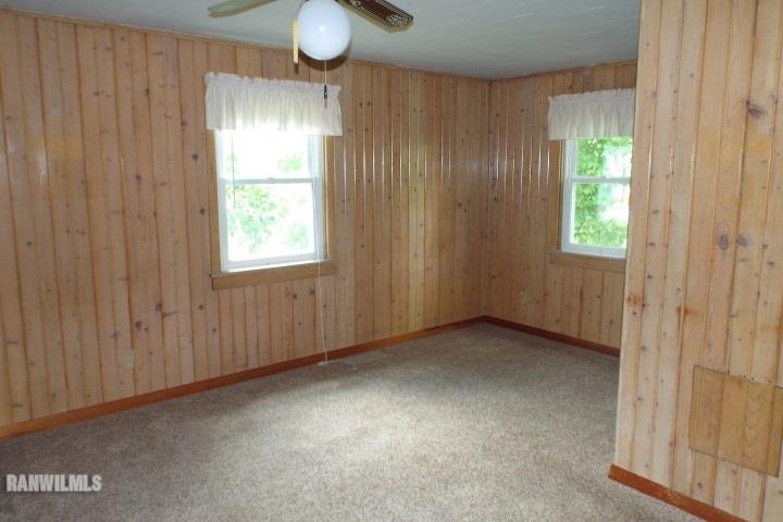 3492 South Eby's Mill Road Elizabeth, IL 61028 - Photo 8 of 20 an empty room with windows