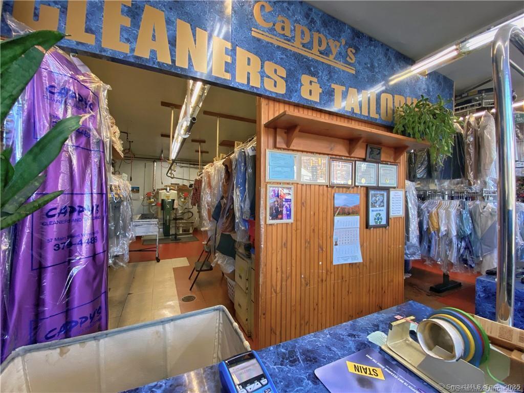 57 Main Street Winchester, CT 06098 - Photo 17 of 27 a room with furniture and wooden floor