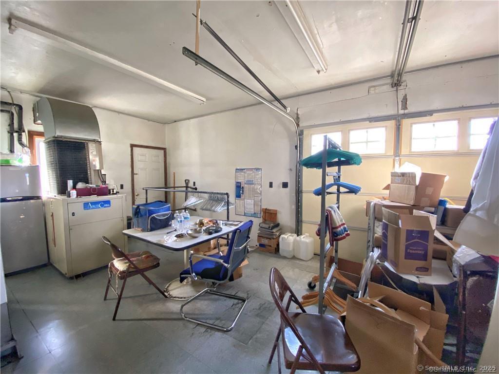 57 Main Street Winchester, CT 06098 - Photo 23 of 27 a view of a room with gym equipment