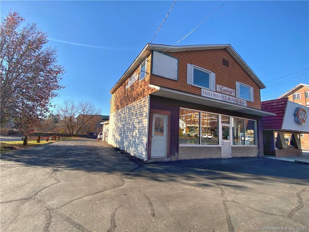 57 Main Street Winchester, CT 06098 - Photo 7 of 27 a front view of a house