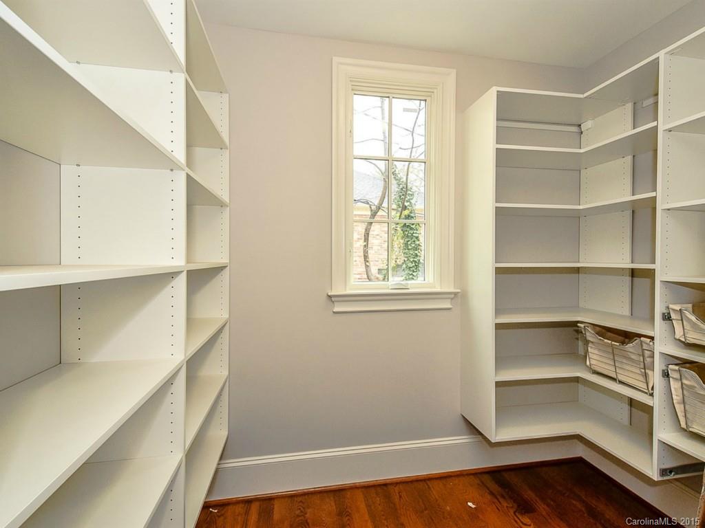 522 Ashworth Road Charlotte, NC 28211 - Photo 8 of 24 a view of an empty room with a window