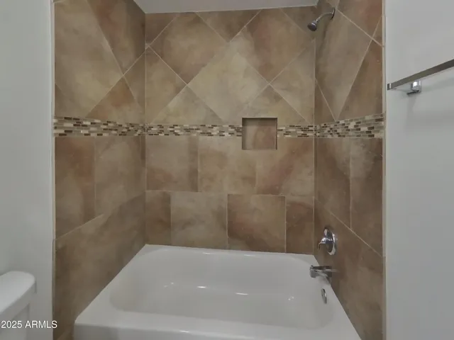 a bathroom with a bathtub