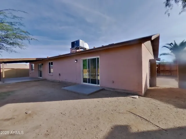 a front view of a house with a garage