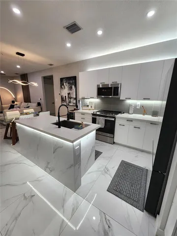 a living room with furniture and a couch