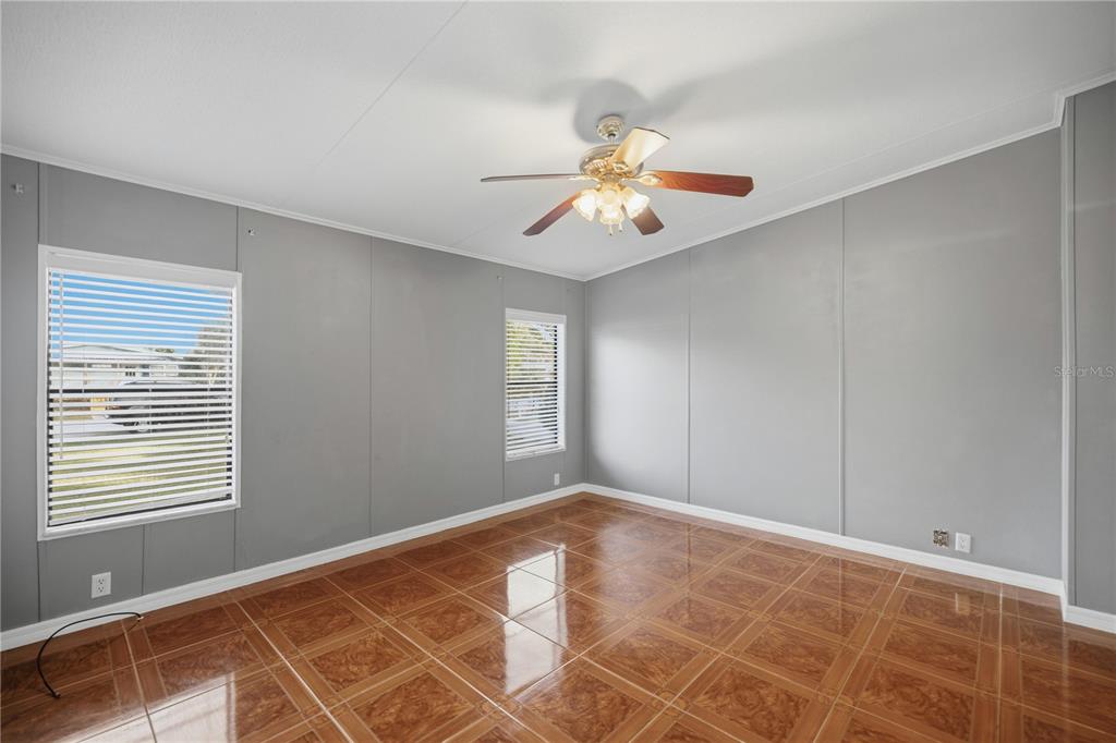 6524 Southeast 110th Lane Belleview, FL 34420 - Photo 11 of 32 a view of an empty room with a window