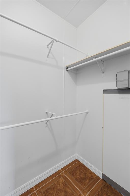 6524 Southeast 110th Lane Belleview, FL 34420 - Photo 15 of 32 a view of a room with racks on the wall