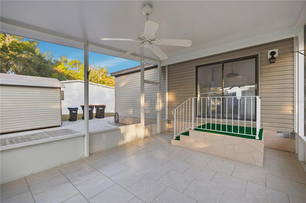 6524 Southeast 110th Lane Belleview, FL 34420 - Photo 22 of 32 a view of a porch with furniture