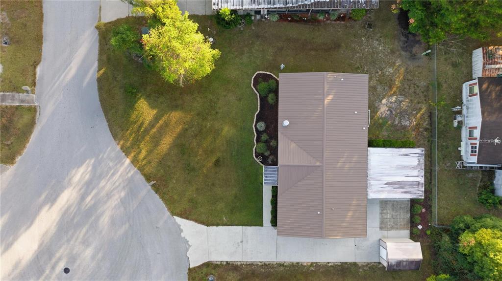6524 Southeast 110th Lane Belleview, FL 34420 - Photo 28 of 32 an aerial view of a house with outdoor space