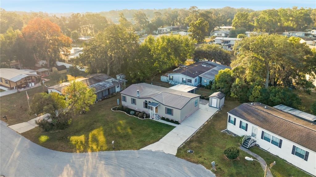 6524 Southeast 110th Lane Belleview, FL 34420 - Photo 29 of 32 an aerial view of residential houses with outdoor space