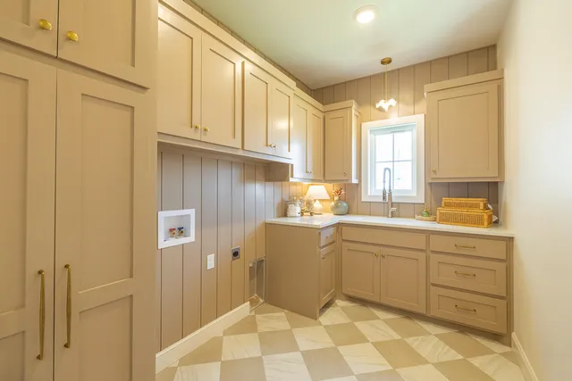 a bed room with a bed and a window