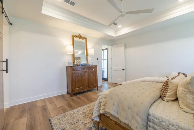 a en suite bathroom with double sink and a mirror