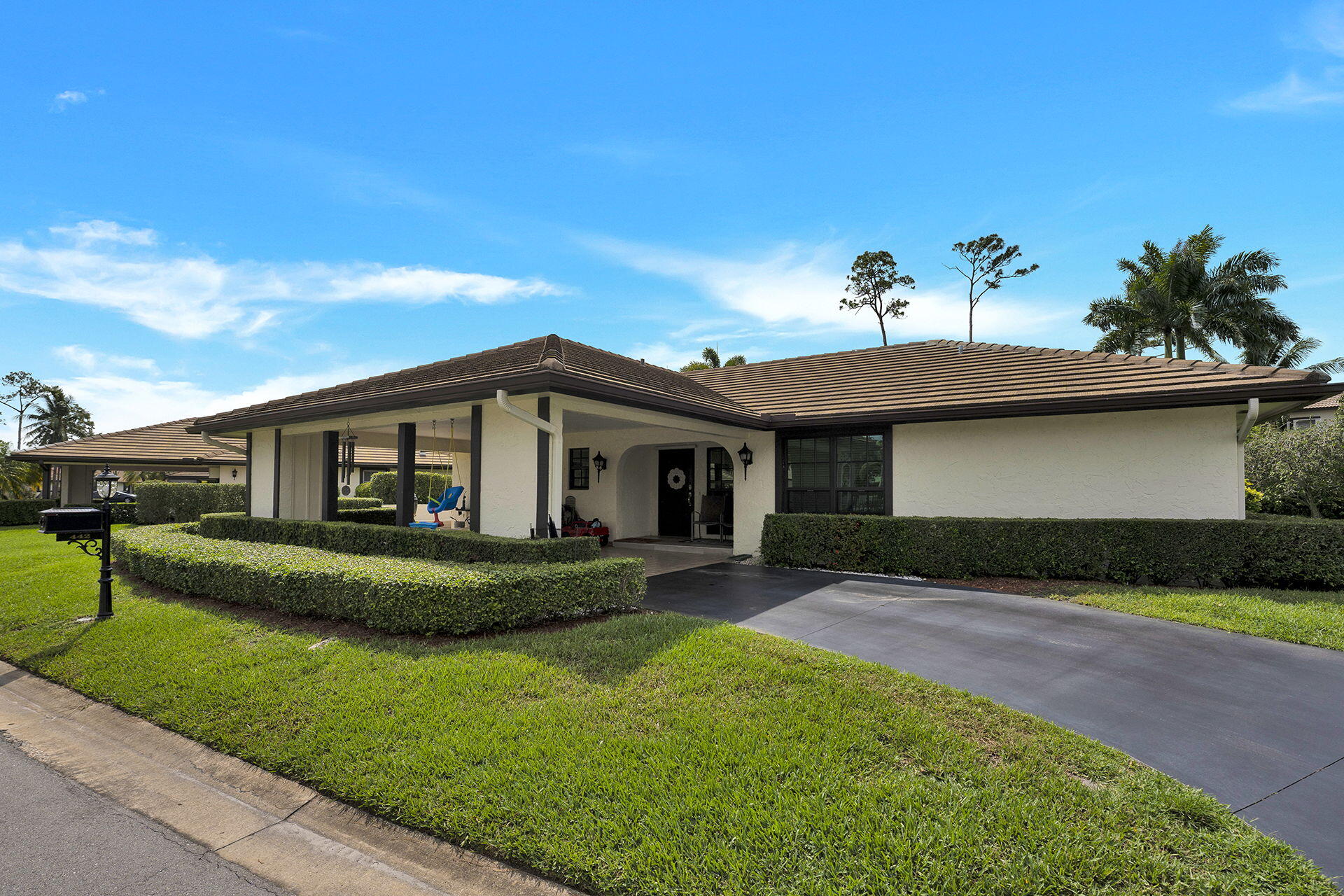 442 Pine Villa Drive Atlantis, FL 33462 - Photo 1 of 25 Front view