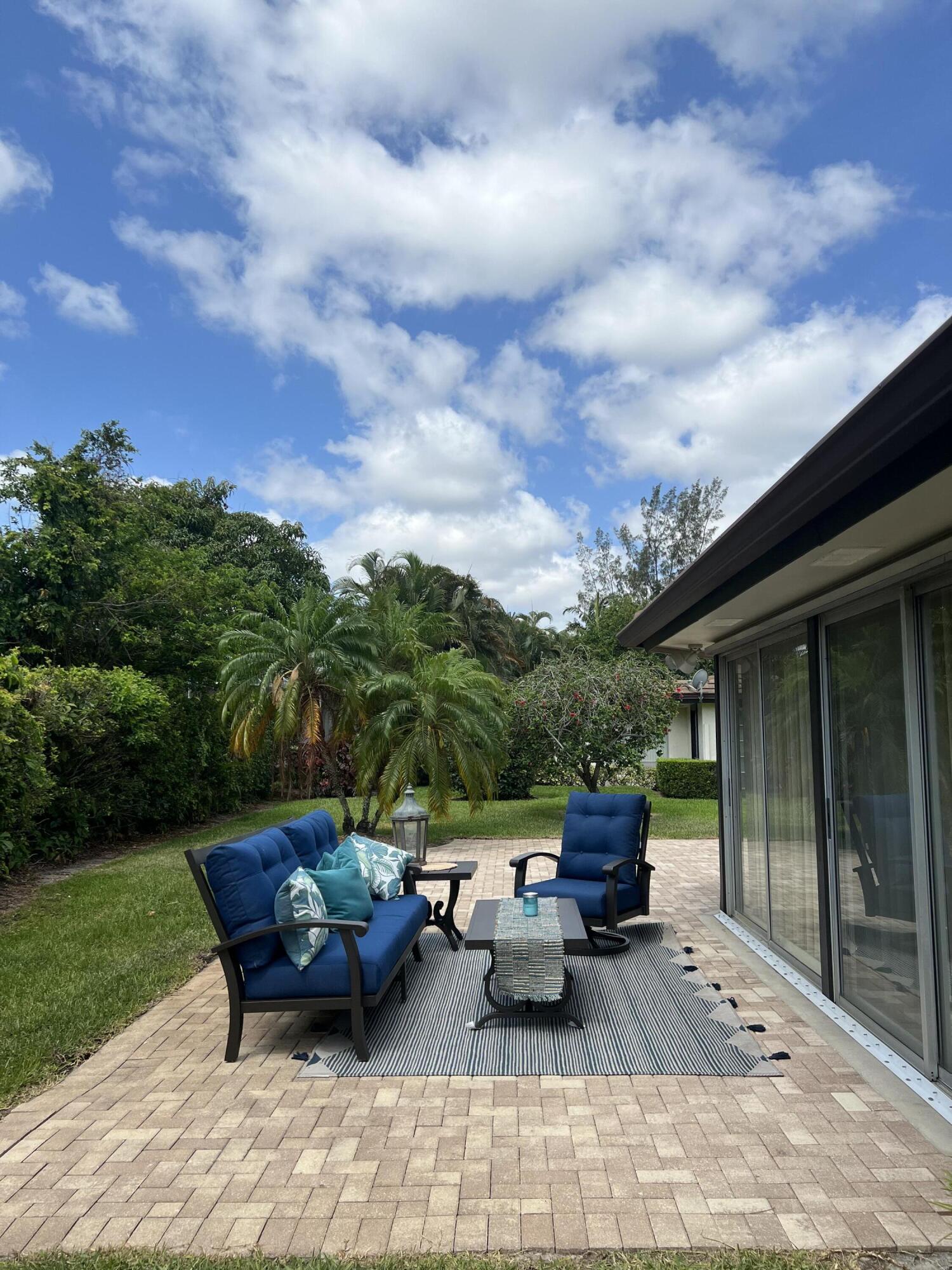 442 Pine Villa Drive Atlantis, FL 33462 - Photo 19 of 25 Patio