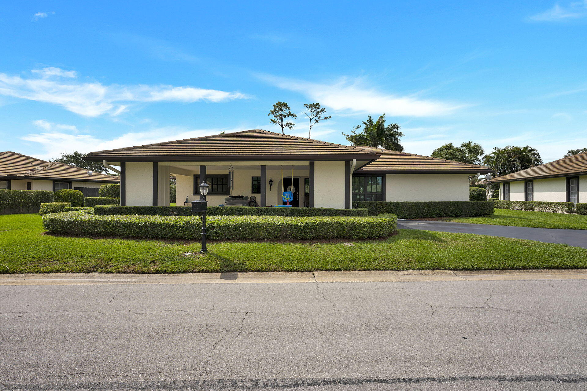 442 Pine Villa Drive Atlantis, FL 33462 - Photo 2 of 25 Front