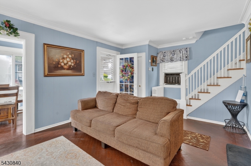 1629 May Street Union, NJ 07083 - Photo 2 of 13 a living room with furniture and a flat screen tv