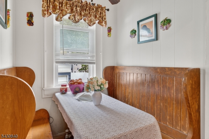 1629 May Street Union, NJ 07083 - Photo 4 of 13 a living room with furniture and a window