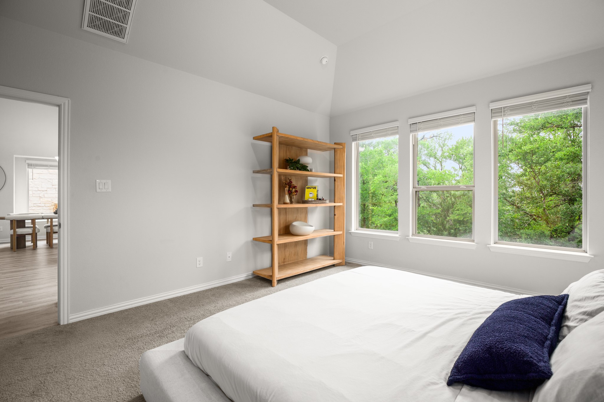 6708 Avila Way Pflugerville, TX 78660 - Photo 16 of 36 a bedroom with a bed and a large window