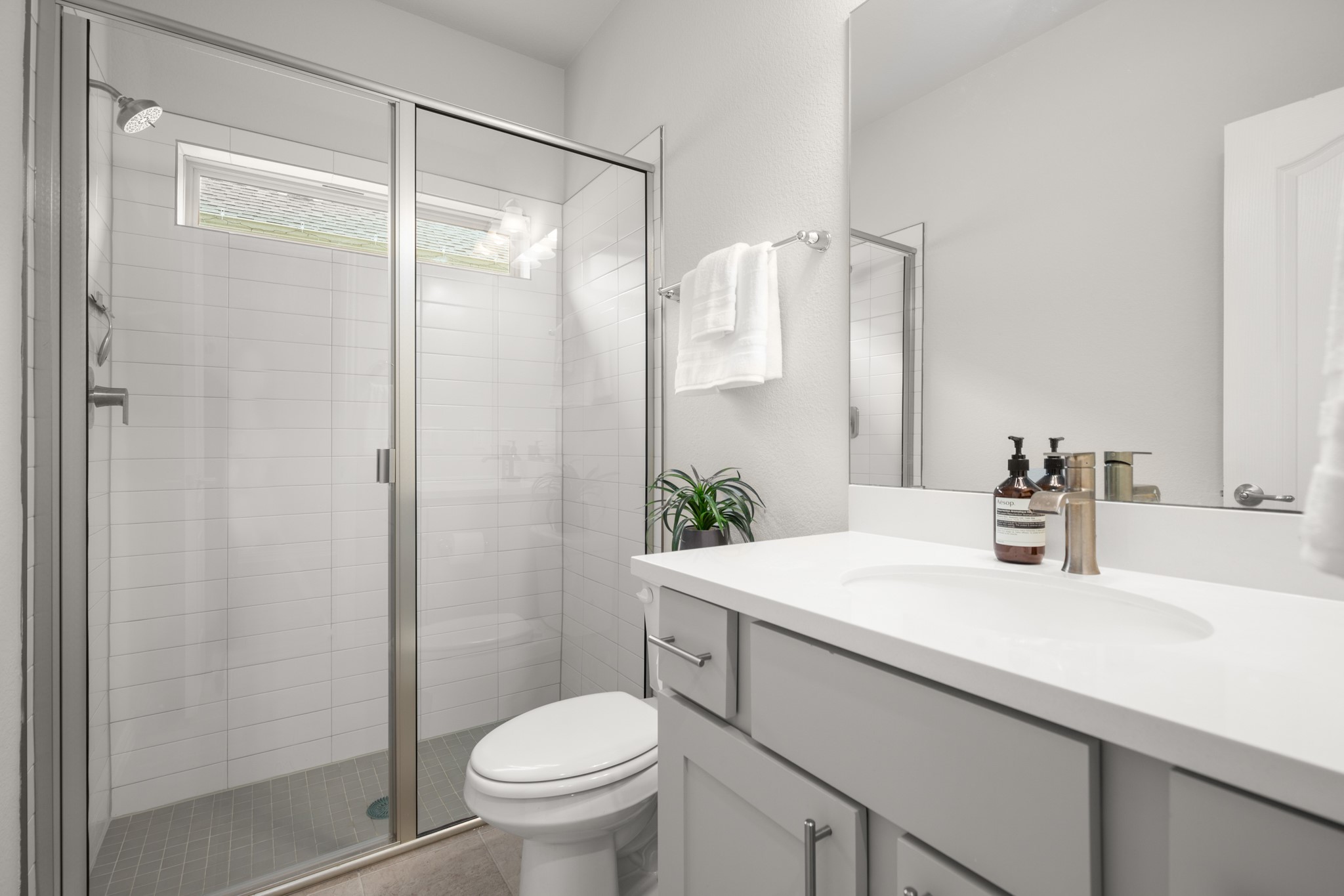 6708 Avila Way Pflugerville, TX 78660 - Photo 22 of 36 a bathroom with a sink toilet and shower