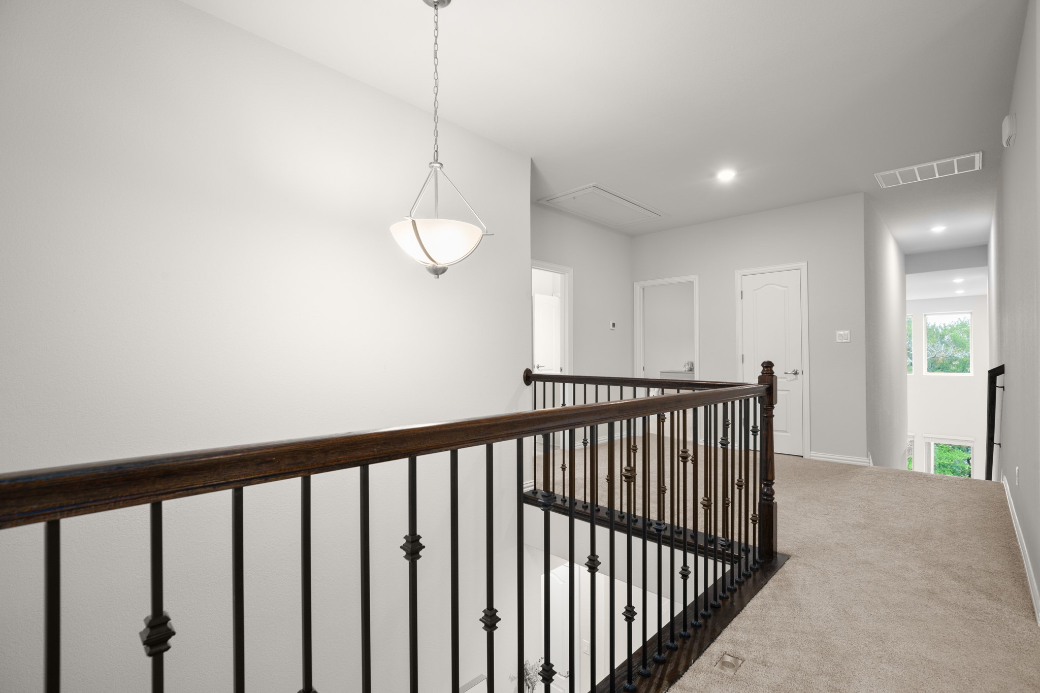 6708 Avila Way Pflugerville, TX 78660 - Photo 25 of 36 a view of a hallway with window